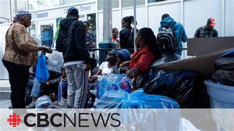 Advocates claim racism as African asylum seekers forced to sleep on Toronto sidewalk